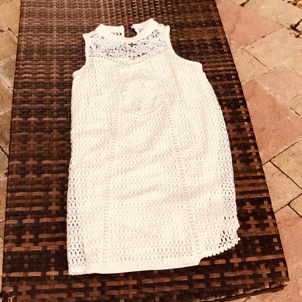 sleeveless lacy white dress